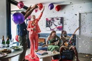 a group of people in a room with balloons at Hard Rock Hotel Ibiza in Playa d'en Bossa