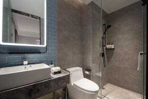 Ένα μπάνιο στο Echarm Hotel Sanya Qiangu Scenario Zone HITS Duty Free City Shop