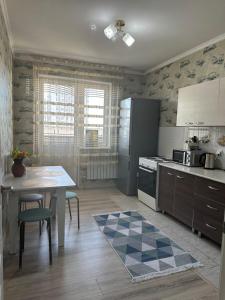 Η κουζίνα ή μικρή κουζίνα στο Utegen2 Apartment