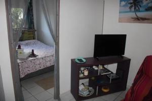 Postel nebo postele na pokoji v ubytování Appartement avec vue sur la mer à La Trinité - 32 m² - Terrasse