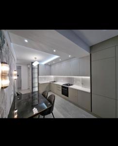 Kuchyň nebo kuchyňský kout v ubytování Airport TAXI & HOTEL APARTAMENTS + 2 fotografie