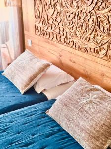 Voodi või voodid majutusasutuse CAPAO Beach Hôtel toas