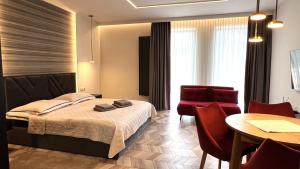 Posteľ alebo postele v izbe v ubytovaní BUNASTA Apartments