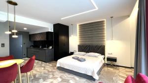 Kuchyňa alebo kuchynka v ubytovaní BUNASTA Apartments