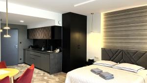 Posteľ alebo postele v izbe v ubytovaní BUNASTA Apartments