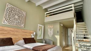 Voodi või voodid majutusasutuse CAPAO Beach Hôtel toas