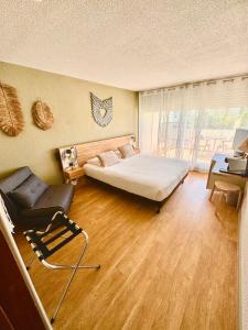 Voodi või voodid majutusasutuse CAPAO Beach Hôtel toas
