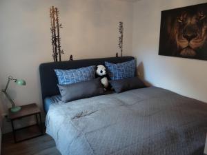 Postel nebo postele na pokoji v ubytování Barth-Tor-zum-Darss-Zingst-B