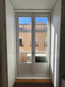 Μπαλκόνι ή βεράντα στο Private rooms in Magdalena Street