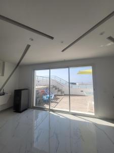 Fotografija v galeriji nastanitve Appartement avec piscine vue sur mer v mestu Raʼs al Jabal