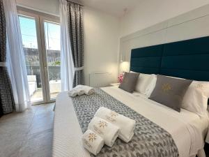 Postel nebo postele na pokoji v ubytování Good Vibes Luxury Rooms