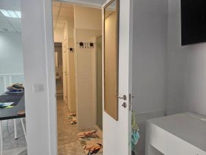 Телевізор і / або розважальний центр в Corralejo Coliving by Amazzzing Travel