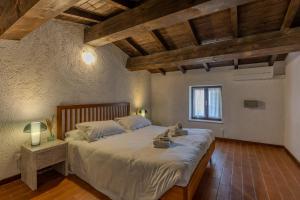 Postel nebo postele na pokoji v ubytování Residence San Michele + 37 fotografií