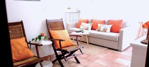 Posezení v ubytování alaia apartamento