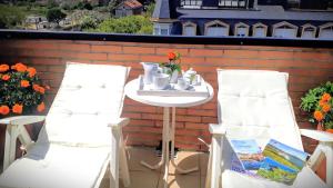 Posezení v ubytování alaia apartamento