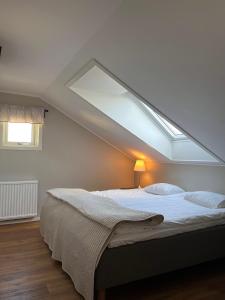 Postel nebo postele na pokoji v ubytování Hotell Villa Solviken