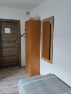 Łóżko lub łóżka w pokoju w obiekcie Agroturystyka u Pawła i Asi