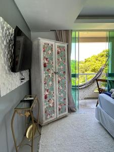 Μια τηλεόραση ή/και κέντρο ψυχαγωγίας στο Pousada Morada Porto Verde