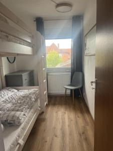 Katil atau katil-katil dalam bilik di Ferienwohnung Olendorp +10 gambar