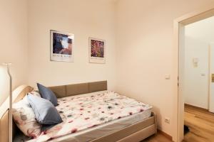 Posteľ alebo postele v izbe v ubytovaní MALIXA - Apartment in the heart of Vienna next to Metro