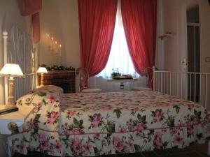 Postel nebo postele na pokoji v ubytování B&B Il Moscondoro