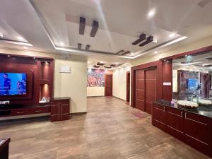 TV a/nebo společenská místnost v ubytování Vensa corporate Inn