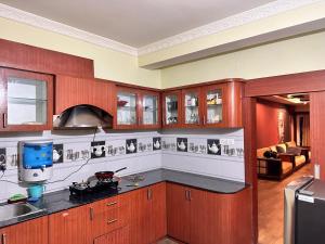 Kuchyň nebo kuchyňský kout v ubytování Vensa corporate Inn