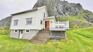 a house on a hill with a mountain at Eggum Panorama in Eggum +18 photos