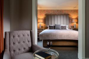 A bed or beds in a room at The Victoria