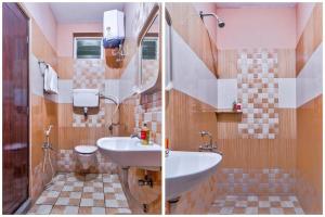 Koupelna v ubytování Grand Ocean inn + 23 fotografií