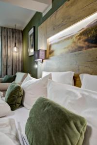 Postel nebo postele na pokoji v ubytování Ringhotel Sonnenhof