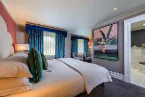 A bed or beds in a room at The Victoria