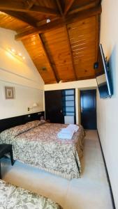 Cama ou camas em um quarto em Hotel Villa Brescia