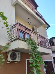 a balcony on the side of a building at Villa Kale Luxury in Skopje