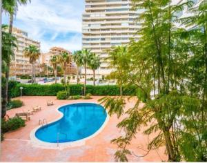 Bazén v ubytování Excelsior Beachfront Apartment Calpe nebo v jeho okolí