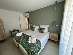Ένα ή περισσότερα κρεβάτια σε δωμάτιο στο Casa da Zéfinha - Villa, em Cinfães, no Douro