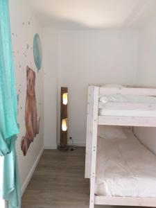 Voodi või voodid majutusasutuse MANOIR ST YVES -Gîte toas