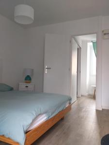 Voodi või voodid majutusasutuse MANOIR ST YVES -Gîte toas
