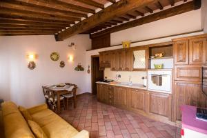 Kuchyň nebo kuchyňský kout v ubytování Antica Fonte Residenza di Siena
