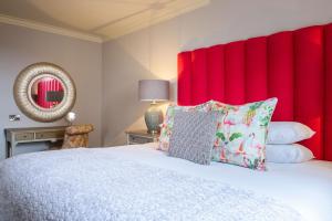 A bed or beds in a room at The Victoria
