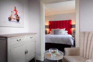 A bed or beds in a room at The Victoria
