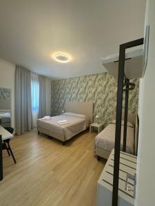 Postel nebo postele na pokoji v ubytování Guest House al porto