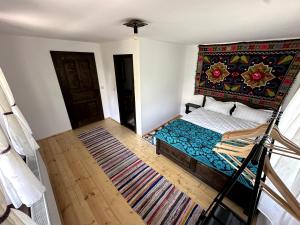 Giường trong phòng chung tại Casa Bunicilor Ciocanu