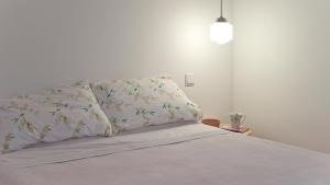 מיטה או מיטות בחדר ב-Duque´s Apartments