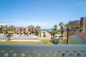 a balcony with a view of a parking lot at Marisol Condo 301 in South Padre Island