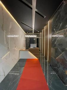 Et opholdsområde på Suíte Silver 202