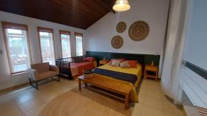 Ένα ή περισσότερα κρεβάτια σε δωμάτιο στο Casa da XV - Iguape, S.P +28 φωτογραφίες