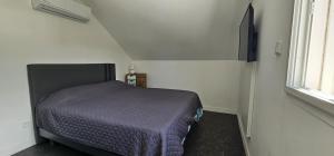 Ένα ή περισσότερα κρεβάτια σε δωμάτιο στο Villa Soleil