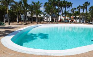 The swimming pool at or close to Casa del Mar Air-conditioned Apartment with Swimming Pools - Corralejo Playa