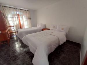 Hotel MESONERO客房内的一张或多张床位